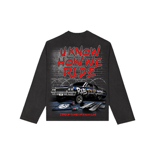 Black long-sleeve shirt with graphic design and text on the back