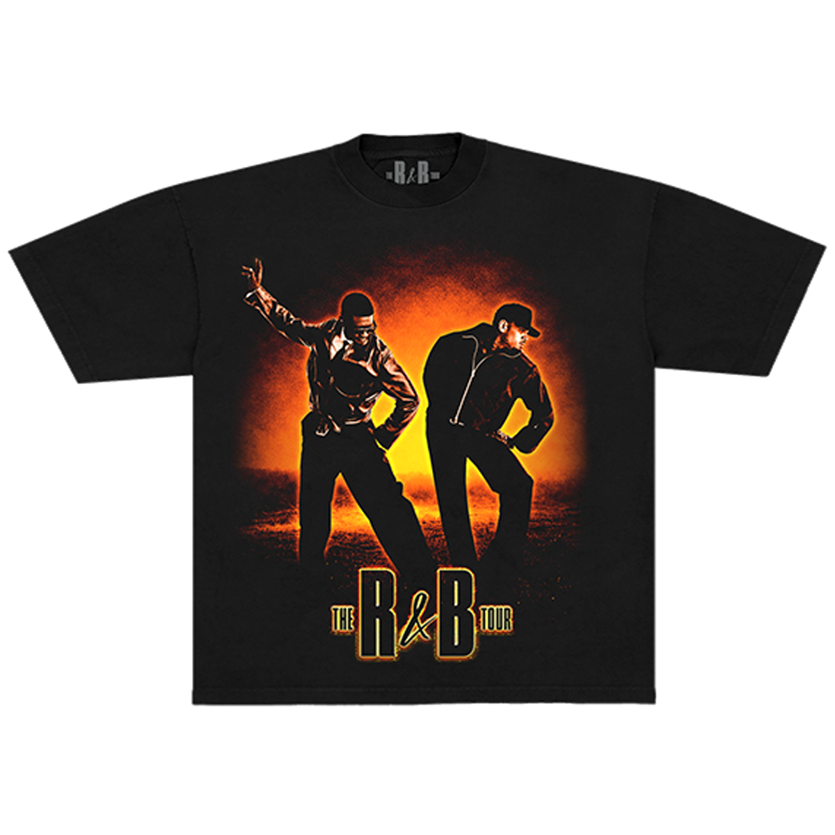 A black short-sleeve graphic t-shirt featuring a stylized print of two men dancing against an orange and yellow sunset background, with the text 'THE R&B TOUR' printed below.