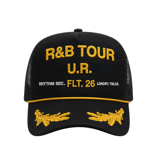 Black cap with yellow text and designs featuring R&B Tour